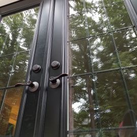 <p>New patio door, ProVia 20 gauge steel in factory finished black with simulated divided lite grids.</p>
